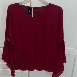 Maroon blouse with fluttery sleeves